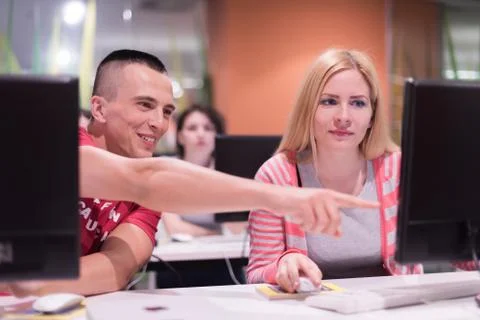 Technology students group working  in computer lab school  classroom Foto stock