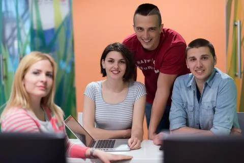 Technology students group working in computer lab school  classroom Stock Photos