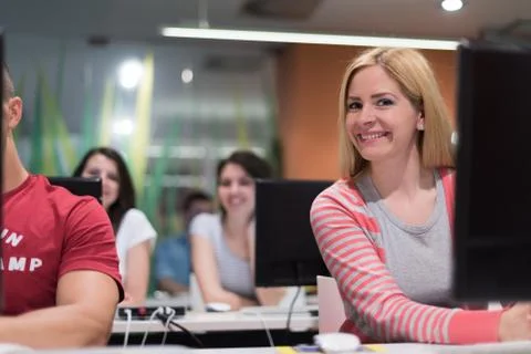 Technology students group working  in computer lab school  classroom Foto stock