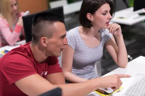 Technology students group working  in computer lab school  classroom Stock Photos