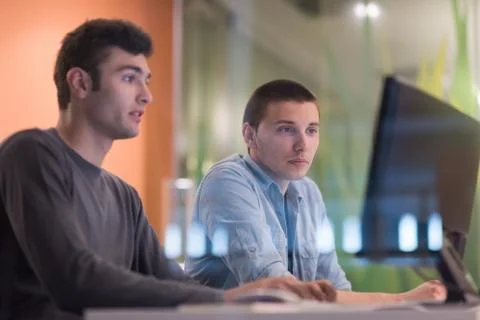 Technology students group working  in computer lab school  classroom Foto stock