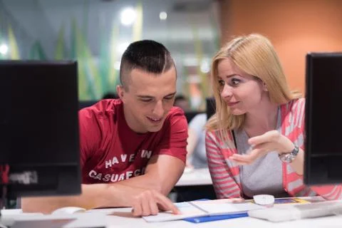 Technology students group working  in computer lab school  classroom Foto stock