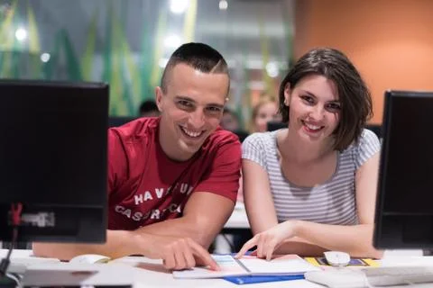 Technology students group working  in computer lab school  classroom Stock Photos
