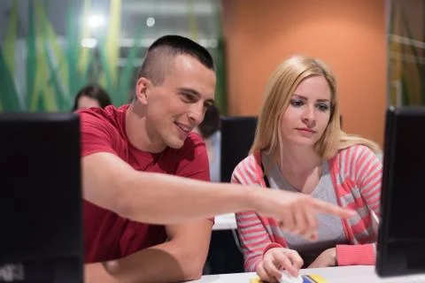 Technology students group working  in computer lab school  classroom Foto stock