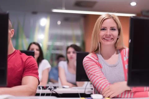 Technology students group working  in computer lab school  classroom Foto stock