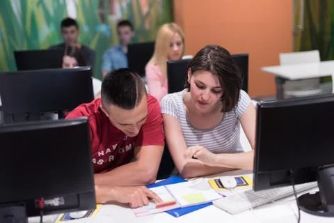 Technology students group working  in computer lab school  classroom Foto stock