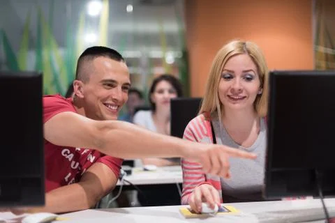 Technology students group working  in computer lab school  classroom Foto stock