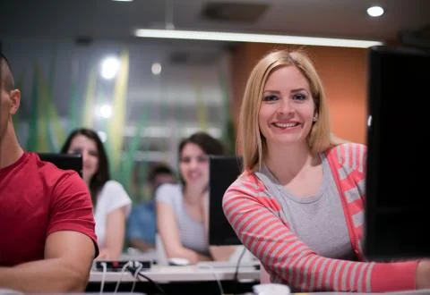 Technology students group working  in computer lab school  classroom Stock Photos