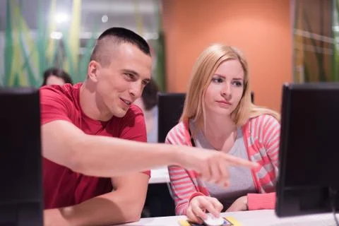 Technology students group working  in computer lab school  classroom Foto stock