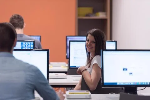 Technology students group working in computer lab school  classroom Foto stock