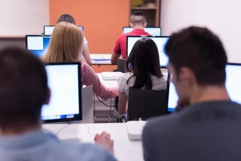 Technology students group working  in computer lab school  classroom Foto stock