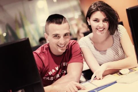 Technology students group working  in computer lab school  classroom Stock Photos