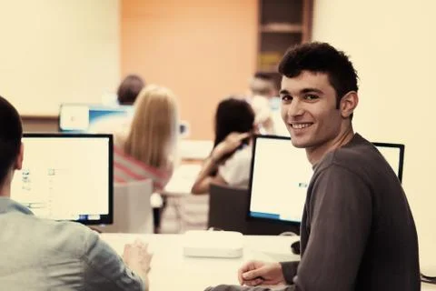 Technology students group working  in computer lab school  classroom Foto stock