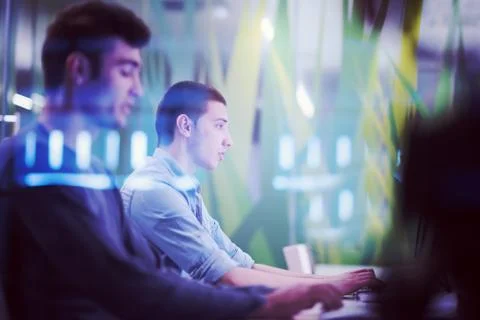 Technology students group working  in computer lab school  classroom Foto stock