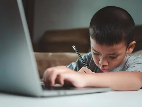 Technology studying at home using laptop computer, Student distance learnin.. Stock Photos