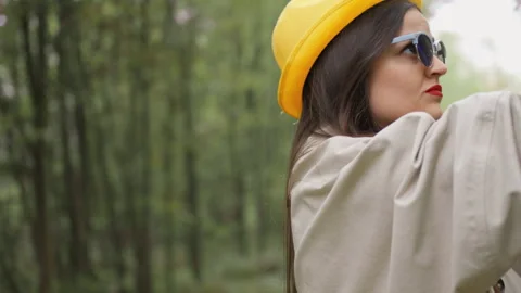 Technology support: In a remote location, a young woman is looking for a mobile Stock Footage 257680187