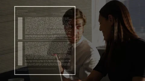 Technology team collaborating on laptop, visualizing data with animated code and Stock Footage 307429200