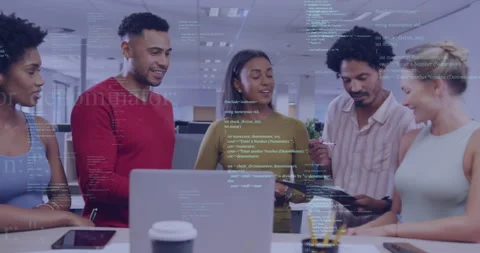 Technology team gesturing, turning on animated code overlay while reviewing and Stock Footage 314172659