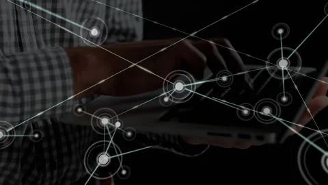 Technology user typing laptop initiating interface and growing network nodes Stock Footage 313703621