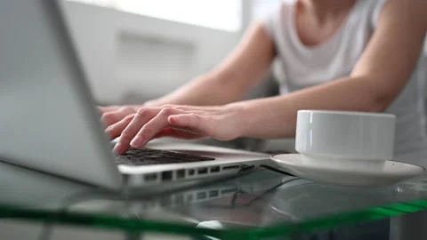 Technology, video conference, virtual event concept - unrecognizable woman with Stock Footage 153420998