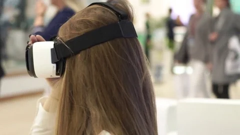 Technology, virtual reality, entertainment and people concept - happy young Stock Footage 73515373