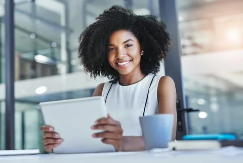 Technology will help you be more efficient. Cropped shot of an attractive young Stock Photos