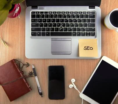 A Technology/Business Concept - high angle view of an office wit Stock Photos