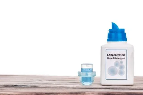 Tecnologically advanced compact concentrated laundry liquid detergent on wood Stock Photos
