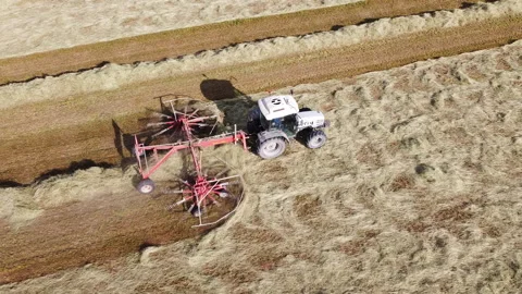 Tedder agricultural machine Stock-Footage 153877842