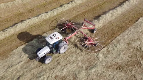 Tedder agricultural machine Stock-Footage 153935274