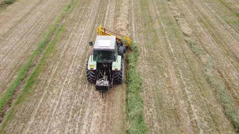 Tedder machinery in action on the ground Stock Footage 163467735