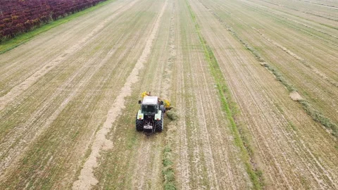 Tedder machinery in action on the ground Stock-Footage 163468235