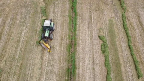 Tedder machinery in action on the ground Stock Footage 163468748