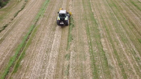 Tedder machinery in action on the ground Stock-Footage 163469783