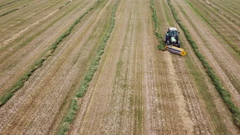 Tedder machinery in action on the ground Stock Footage 163471045