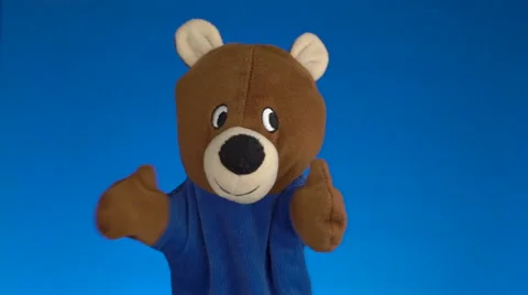 Teddy bear on blue background Stock Footage 61453298