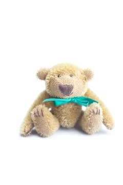 Teddy bear with bow isolated on white Stock-Fotos