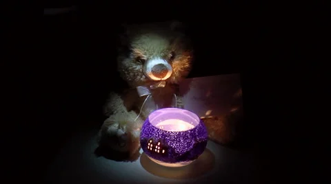 Teddy bear with a candlestick Stock Footage 44025594