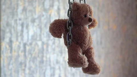Teddy bear hanging Stock Footage 131373438