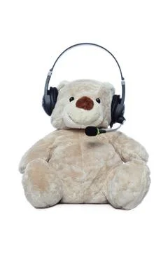 Teddy Bear With Headset isolated over white.jpg Stock Photos
