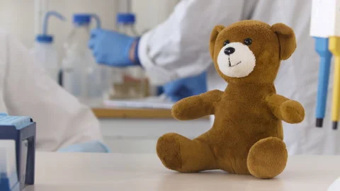 Teddy Bear Injected with a Shot Stock Footage 135698331