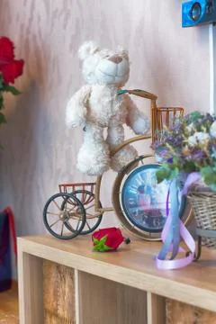 Teddy bear in the interior of the house Stock Photos