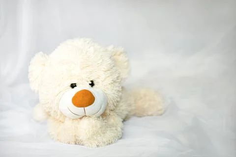 Teddy Bear lying in the bed Stock Photos