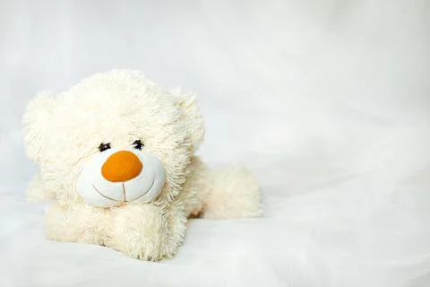 Teddy Bear lying in the bed Stock Photos