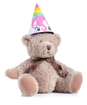 Teddy bear with party cap Stock Photos