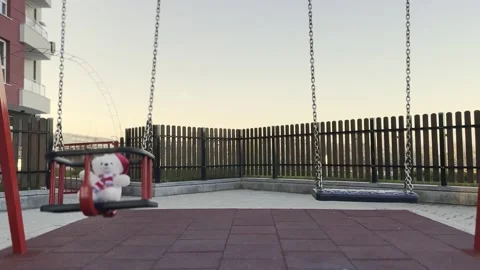 Teddy bear on a swing Video stock 239248869