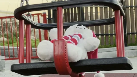 Teddy bear on a swing Video stock 239248871