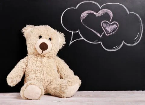 Teddy bear with thoughts of love Stock Photos