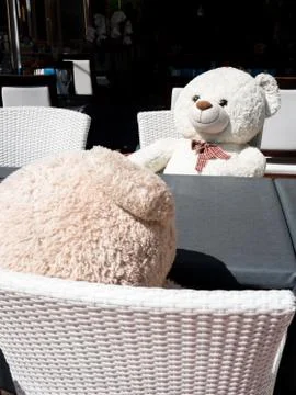 Teddy bears at restaurant Stock Photos