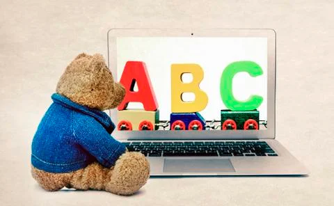 Teddy learns the alphabet Stock Photos